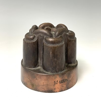 Lot 450 - A Victorian copper jelly mould, height 10cm,...