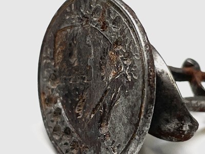 Lot 89 - An 18th-century steel seal with an armorial...