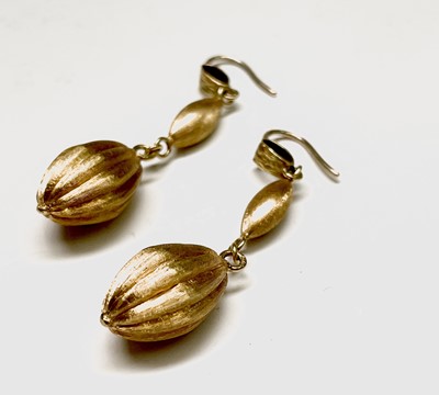 Lot 150 - A pair of contemporary 18ct gold matt earrings...