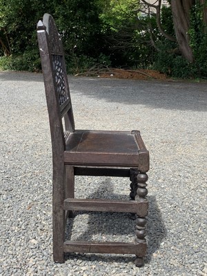 Lot 99 - A Charles II joined oak backstool,...
