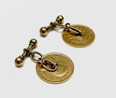 Lot 97 - A pair of 22ct gold half-pond cuff-links dated...