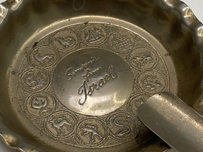 Lot 427 - Four unmatched engraved silver napkin rings,...