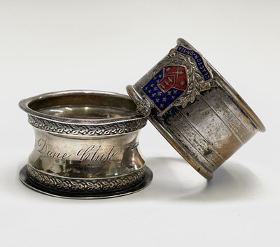 Lot 427 - Four unmatched engraved silver napkin rings,...