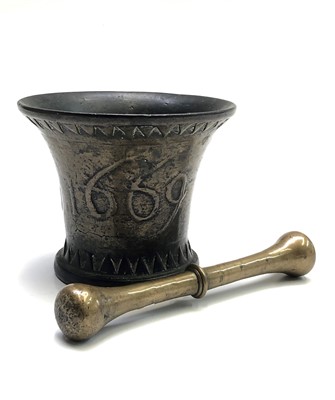 Lot 325 - A 17th century bronze pestle and mortar,...