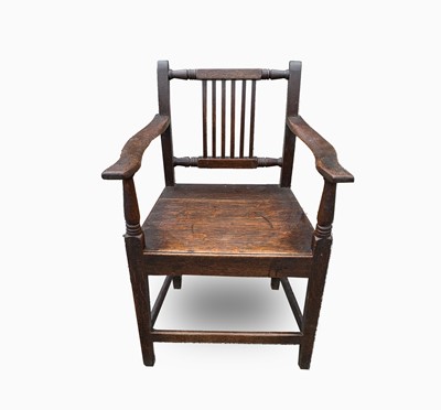 Lot 489 - A George III oak open armchair, with a...