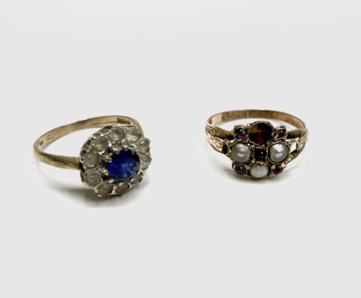 Lot 242 - A Victorian 15ct gold ring set with pearls and...