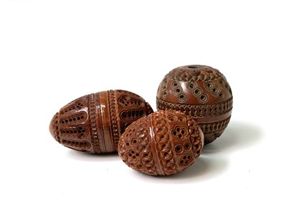 Lot 501 - Three 19th Century carved coquilla nut...