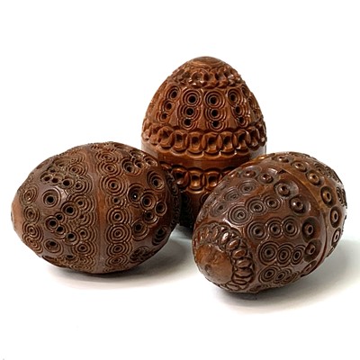 Lot 502 - Three 19th Century carved coquilla nut...