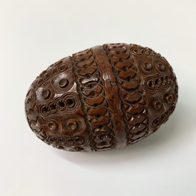 Lot 503 - A 19th Century carved coquilla nut pomander,...