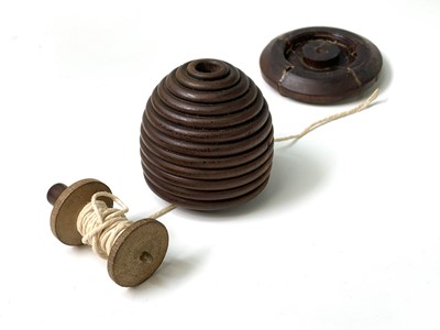 Lot 506 - A 19th century treen string box, in the form...