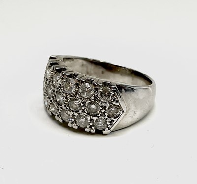 Lot 202 - A chunky 18ct white gold ring with nineteen...