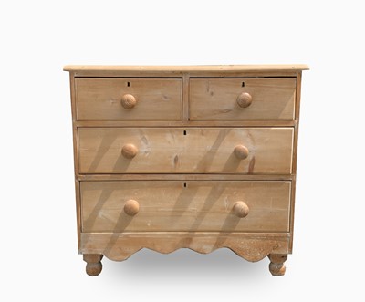 Lot 515 - An early 20th century pine chest of drawers,...