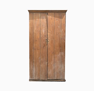 Lot 512 - An early 20th century pine two door cupboard,...