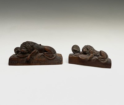 Lot 518 - Two carved wood models of the 'Lion of Lucerne'...