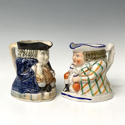 Lot 519 - A Victorian Staffordshire toby jug, height...