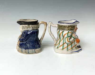 Lot 519 - A Victorian Staffordshire toby jug, height...