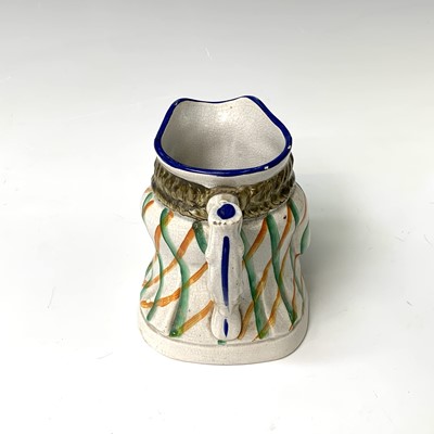 Lot 519 - A Victorian Staffordshire toby jug, height...