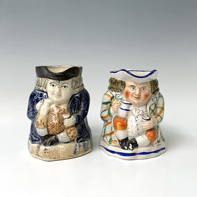 Lot 519 - A Victorian Staffordshire toby jug, height...