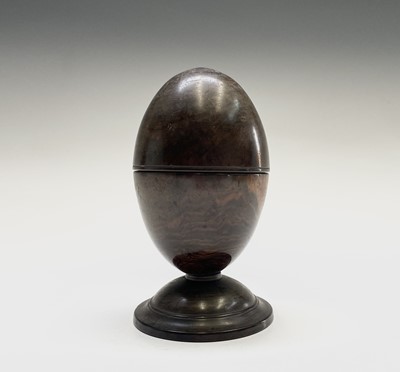 Lot 520 - A 19th century lignum vitae egg-shaped string...