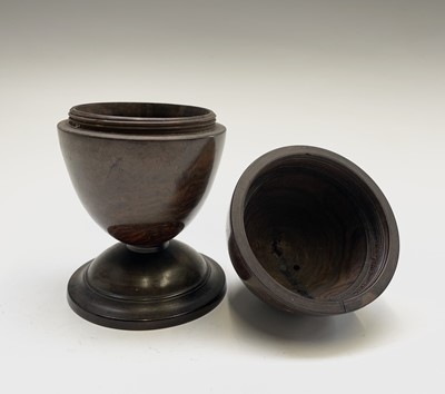 Lot 520 - A 19th century lignum vitae egg-shaped string...