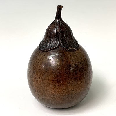 Lot 521 - A 19th century treen jar in the form of an...