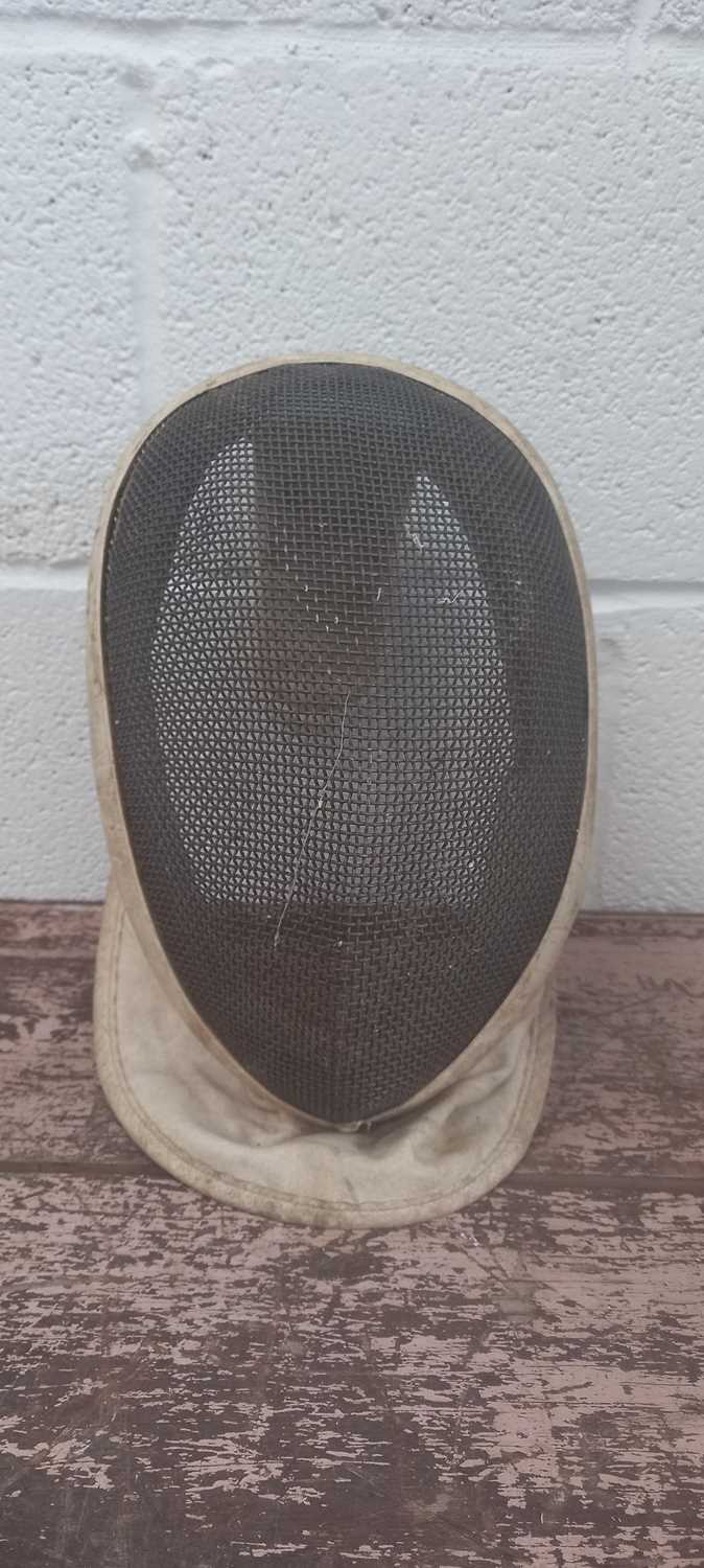 Lot 125 A Leon Paul fencing mask.