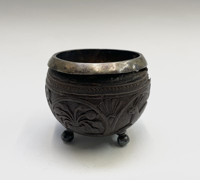 Lot 524 - A 19th century coconut cup, with silver plated...