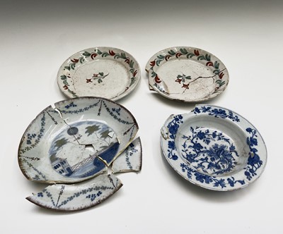 Lot 297 - An 18th century Delft dish, painted with a hot...