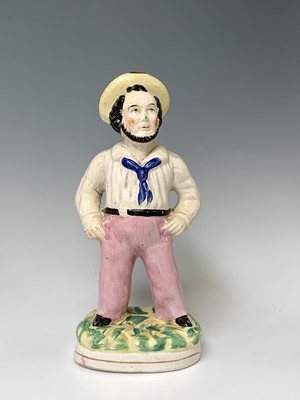 Lot 552 - A Victorian Staffordshire figure of a sailor,...