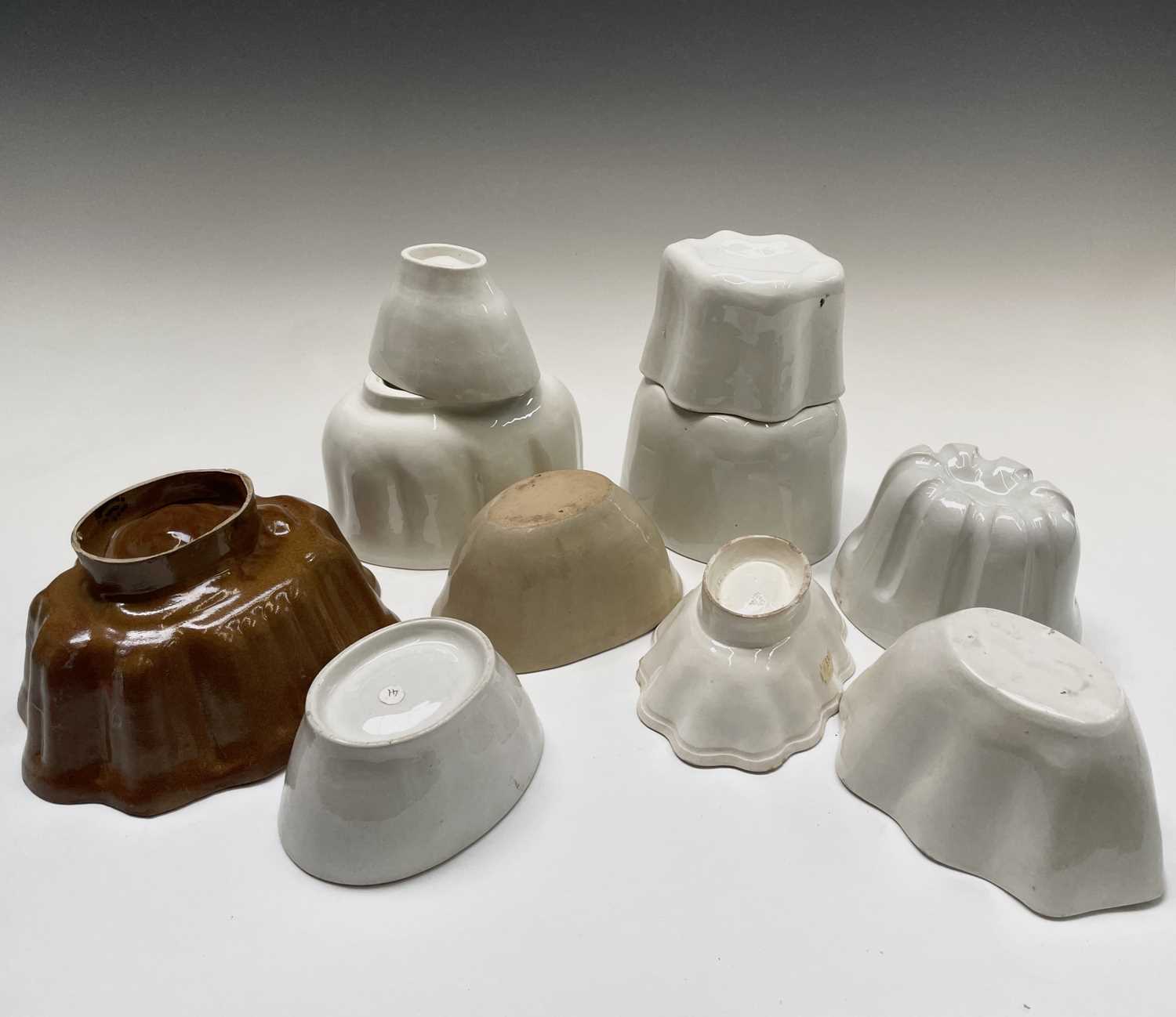 Lot 557 - A selection of ten ceramic jelly moulds....