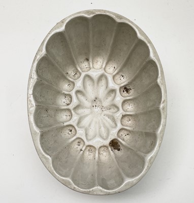 Lot 557 - A selection of ten ceramic jelly moulds....