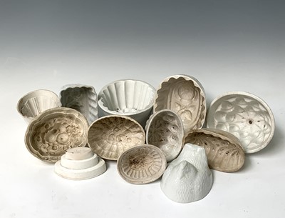 Lot 559 - Twelve various white ceramic jelly moulds....