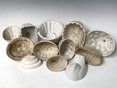 Lot 559 - Twelve various white ceramic jelly moulds....