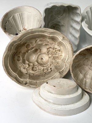 Lot 559 - Twelve various white ceramic jelly moulds....