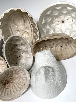 Lot 559 - Twelve various white ceramic jelly moulds....