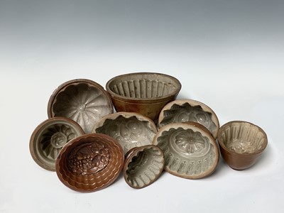 Lot 560 - Nine various salt glazed stoneware jelly...