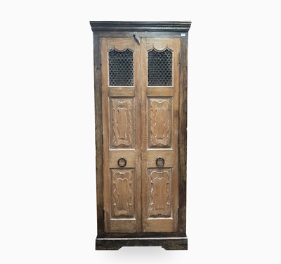 Lot 564 - A large Continental elm kitchen cabinet, the...