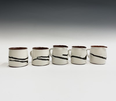 Lot 1283 - Alan BROUGH Three milk jugs and two mugs Each...