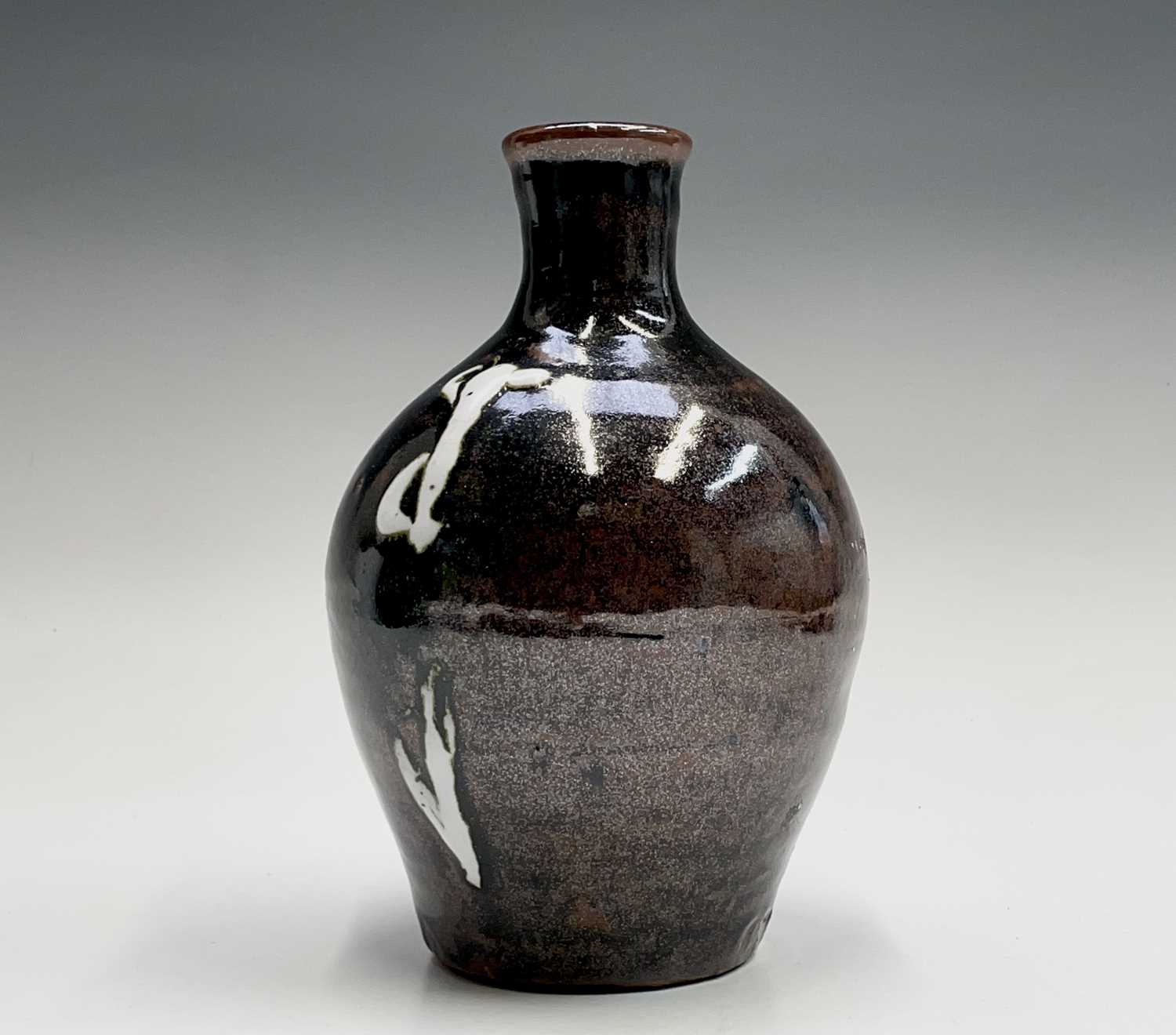 Lot 1308 - Trevor CORSER (1938-2015) A tenmoku glazed...