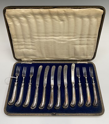 Lot 65 - A set of six dessert knives and forks with the...