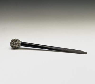 Lot 76 - A Victorian ebonised wood paper knife, the...