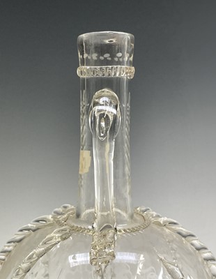 Lot 801 - A 17th century style Dutch glass twin handled...