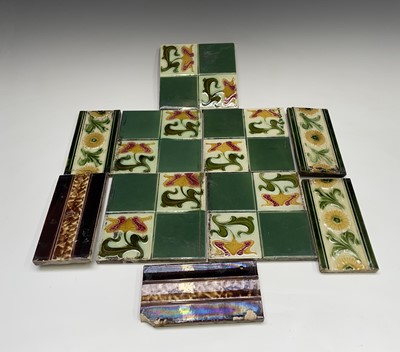 Lot 950 - Five Art Nouveau period tiles of square form...