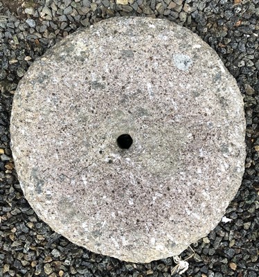 Lot 557 - A circular granite/mill stone staddle stone...