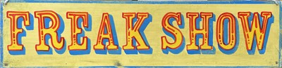 Lot 214 - A signwritten wooden sign 'FREAK SHOW', having...