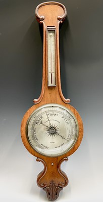 Lot 2908 - A Victorian rosewood wheel barometer, the...