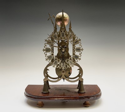 Lot 2909 - A brass cathedral skeleton clock, 20th century,...