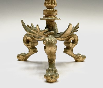 Lot 25 - A pair of gilt metal ornate candelabra,...