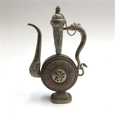 Lot 522 - An early 20th century Islamic copper and white...