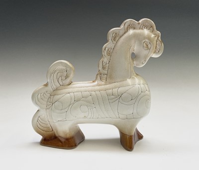 Lot 1305 - A cream Newlyn Pottery horse in Medallion...